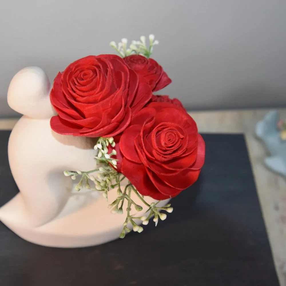 Sexy white curvy hearts vase with 4 red Sola wood roses that will last forever!